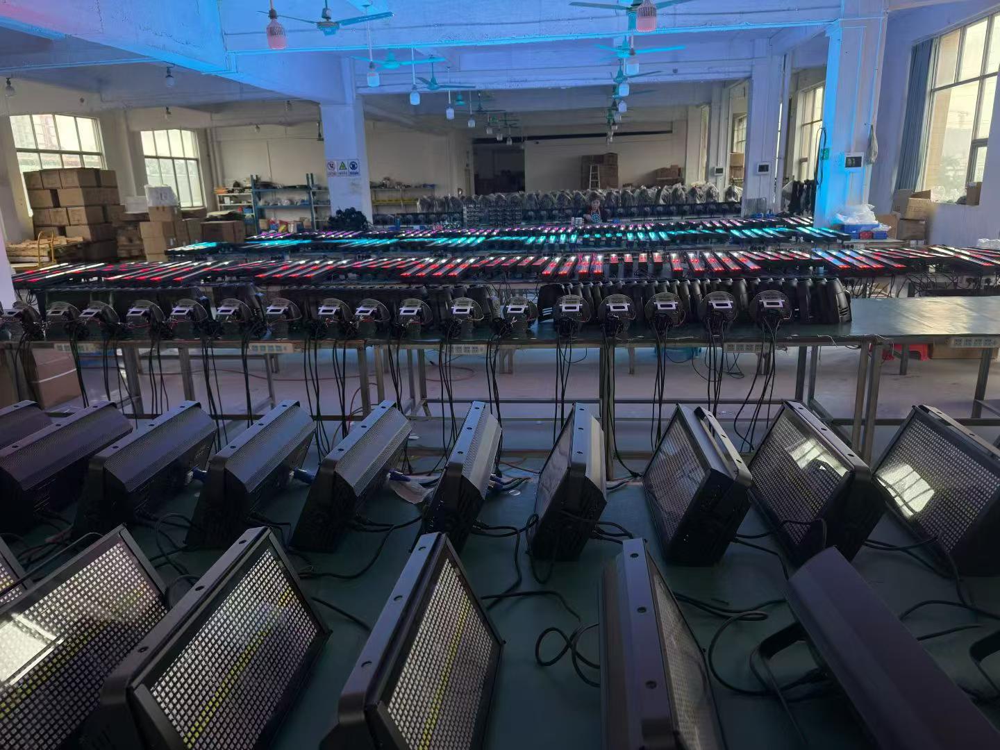 HUIXING workshop with stage lighting fixtures under batch testing